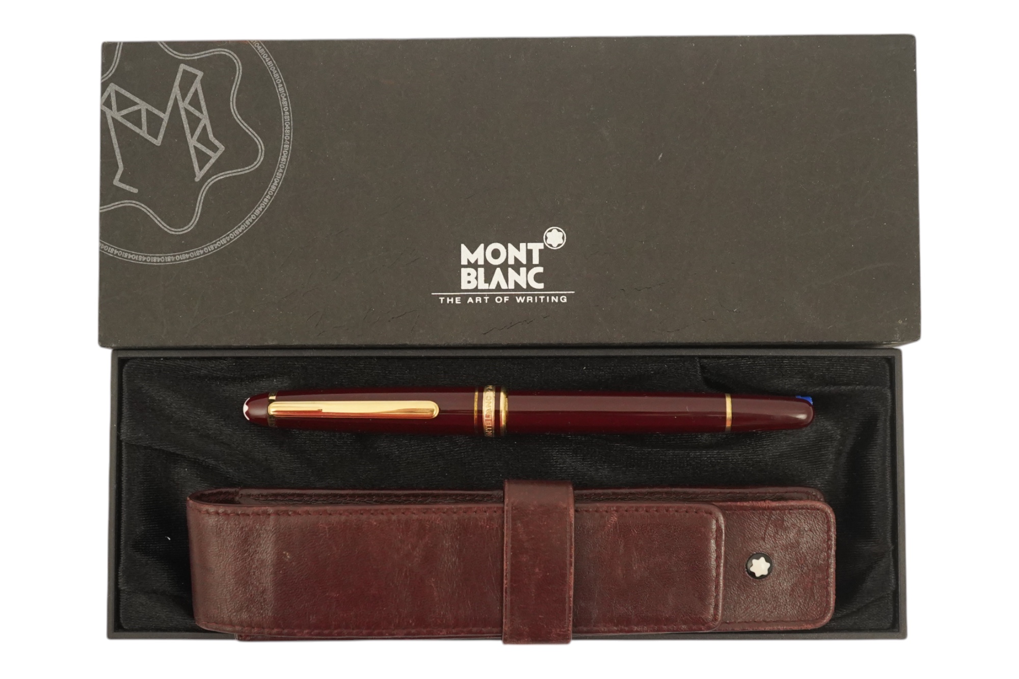 A Mont Blanc Meisterstuck maroon and gilt rollerball pen, boxed with paperwork and leather case